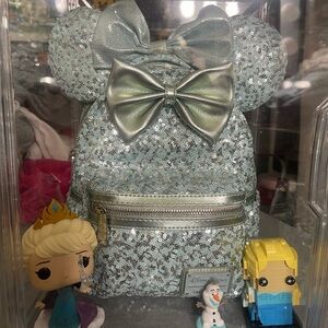 Disney park’s Exclusive Loungefly frozen backpack and ears headband